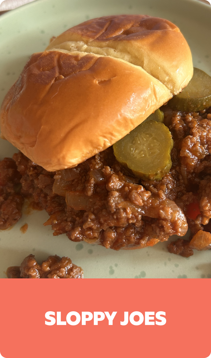 Gopuff Sloppy Joes sandwich with pickles on a bun.