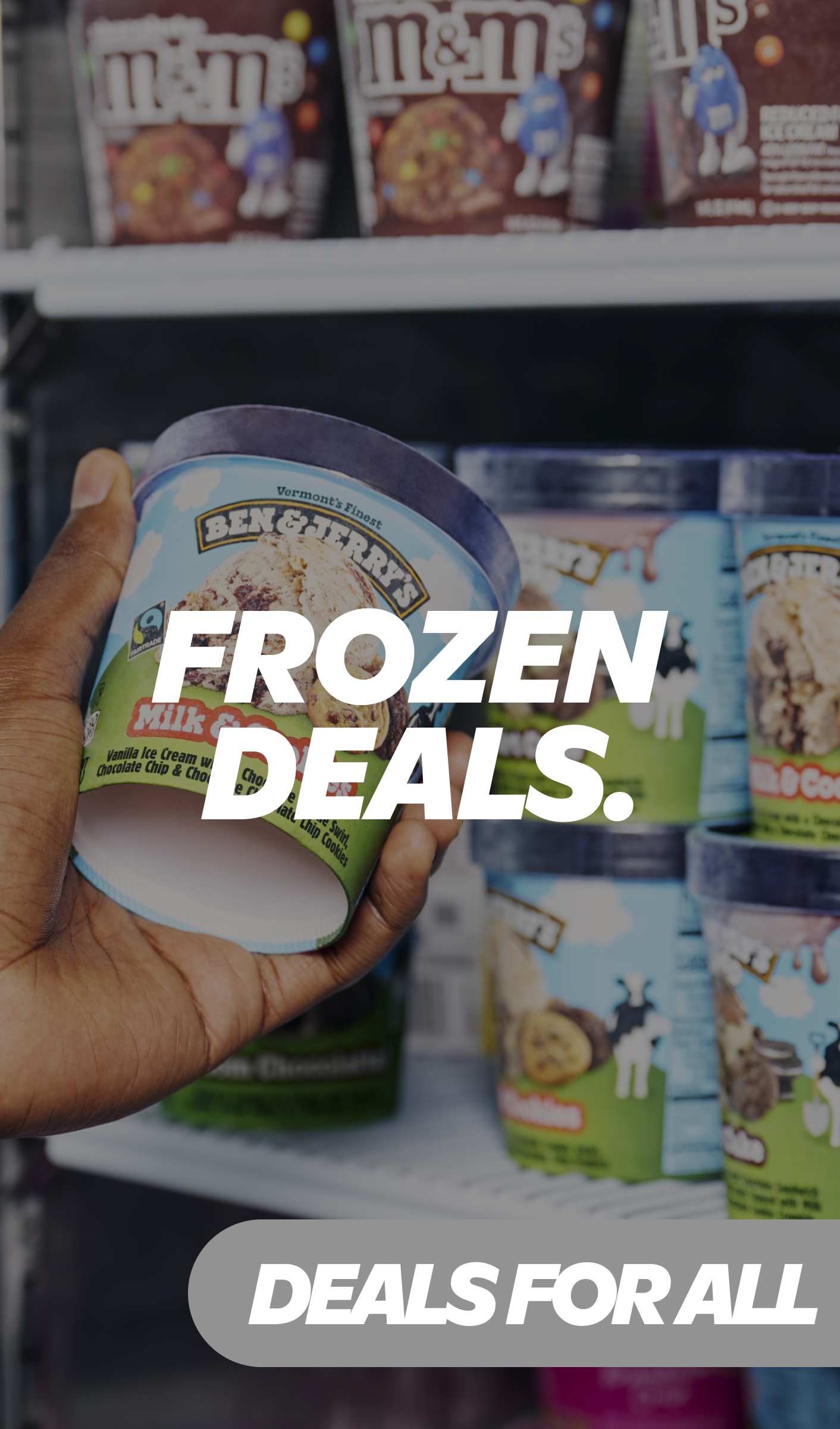 Gopuff frozen deals promotion with hand holding Ben & Jerry’s Milk & Cookies ice cream pint from freezer.