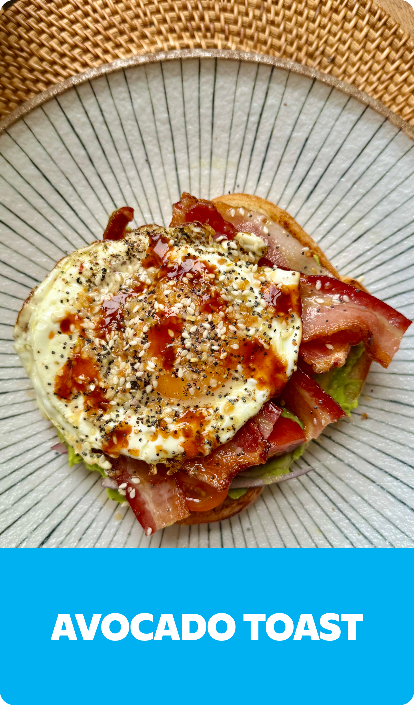 Gopuff avocado toast with bacon, fried egg, everything bagel seasoning, and sauce drizzle.