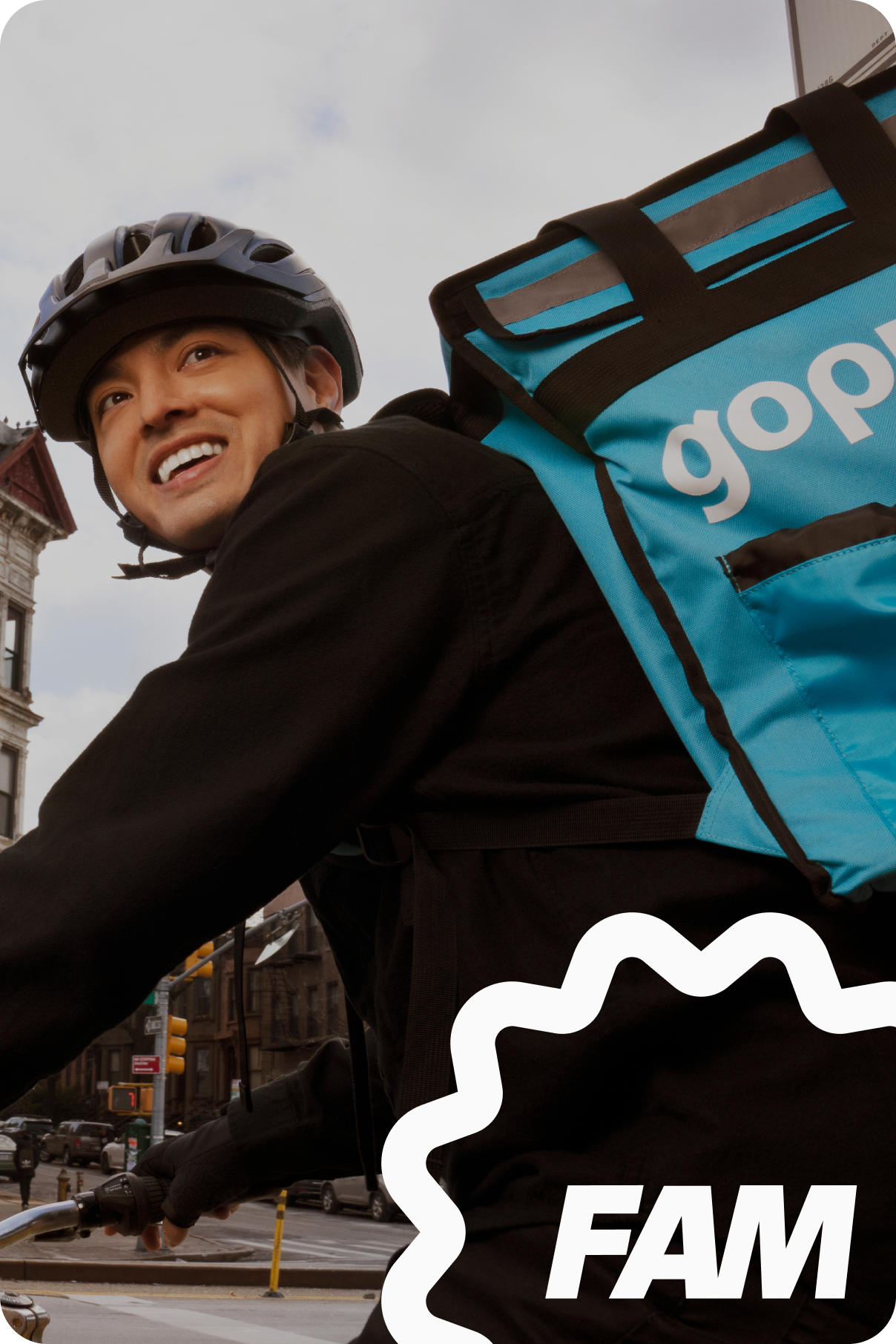 Man riding a gopuff delivery bicycle