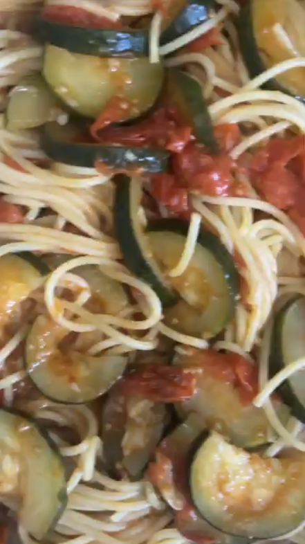 Gopuff spaghetti with zucchini and tomatoes, a fresh pasta dish.