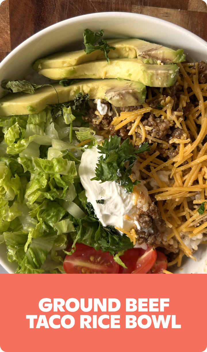 Gopuff Ground Beef Taco Rice Bowl with avocado, cheese, lettuce, tomatoes, and sour cream.
